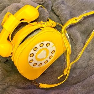 Cute purse attached with usable phone